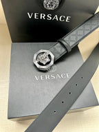 Versace belt with embossed strap and round lion medallion buckle on display box