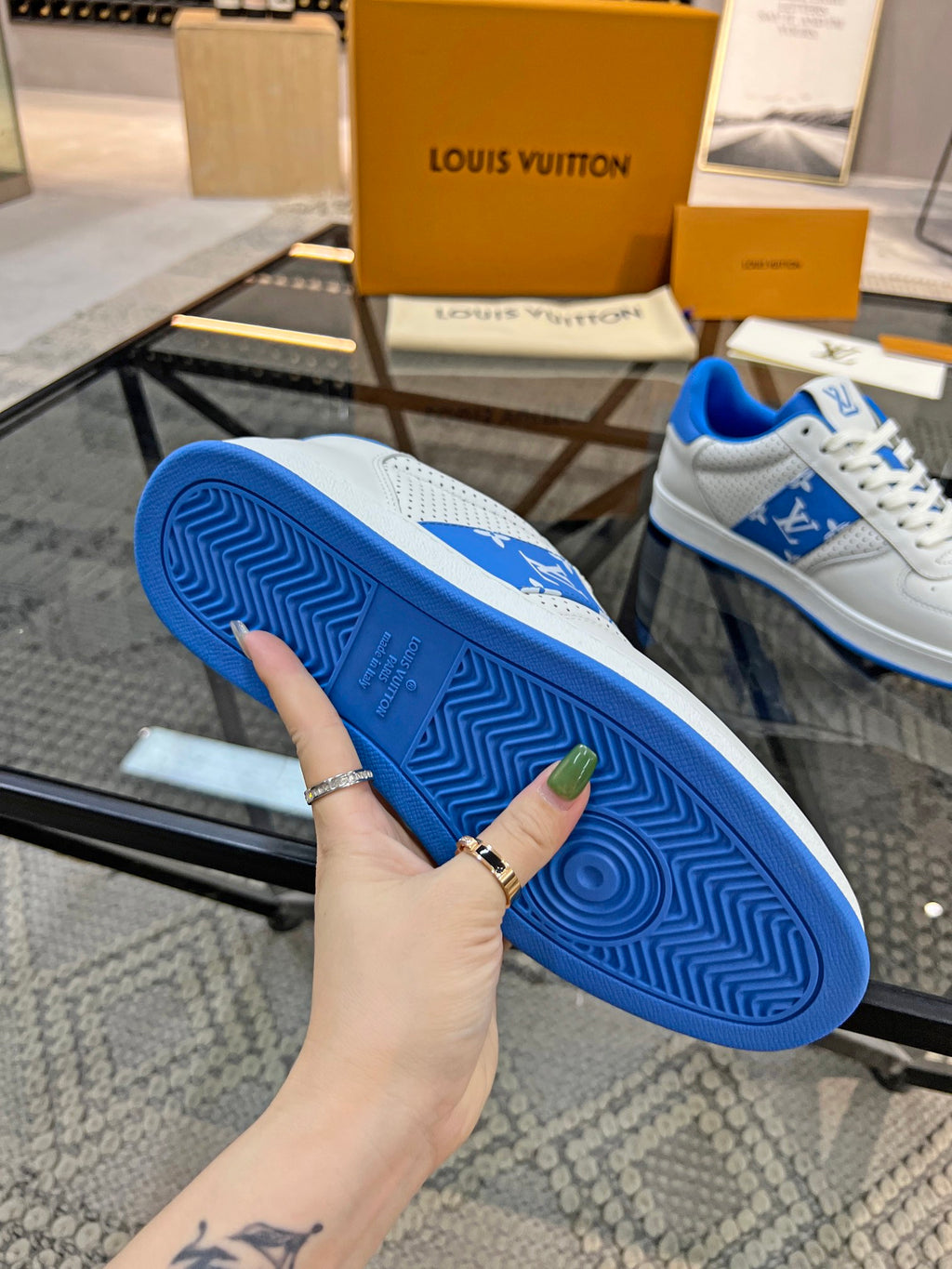 Louis Vuitton sneakers outsole view with blue tread and white base