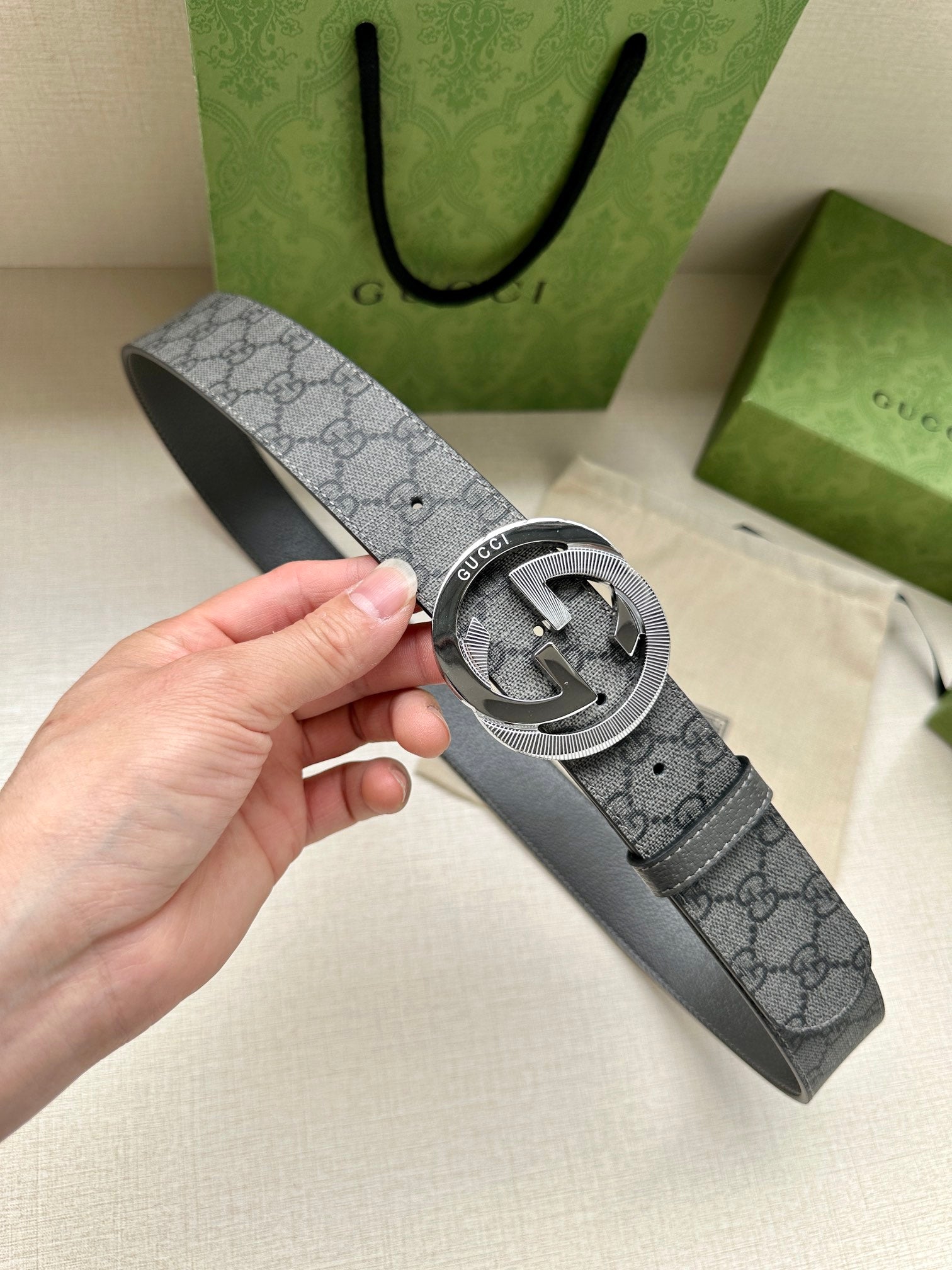 Gucci belt in dark gray canvas with GG pattern and silver-tone logo buckle