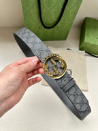 Gucci belt with dark gray GG canvas strap and gold-tone double G buckle