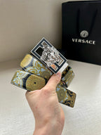Versace belt with gold-blue patterned strap and baroque lion medallion buckle