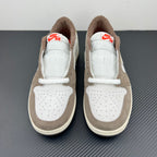 Low-top sneakers heel view, white panels with brown suede lining and Nike Air tag