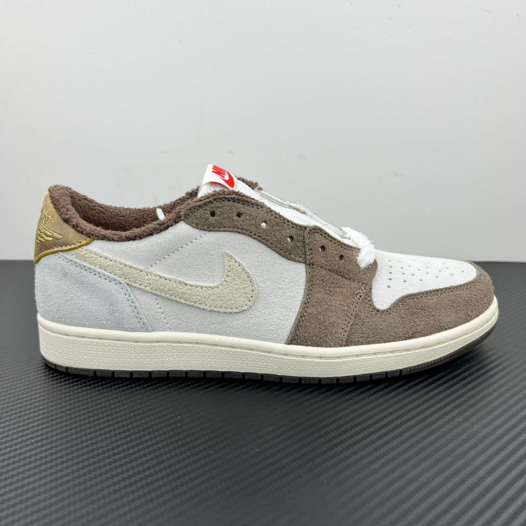 Low-top sneakers with white panels, brown suede, gold Swoosh, red Nike Air tongue mark