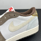 Low-top sneakers side view, light gray leather with brown suede and gold Swoosh detail