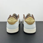 Low-top sneakers back view, white leather with brown suede and gold embroidered detail