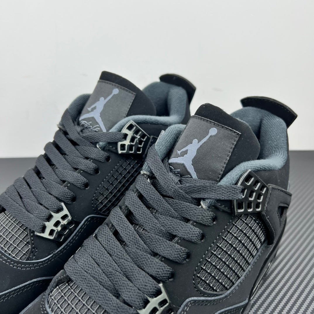 Air Jordan 4 sneakers close-up of laces, mesh quarter panel, and lace cage details