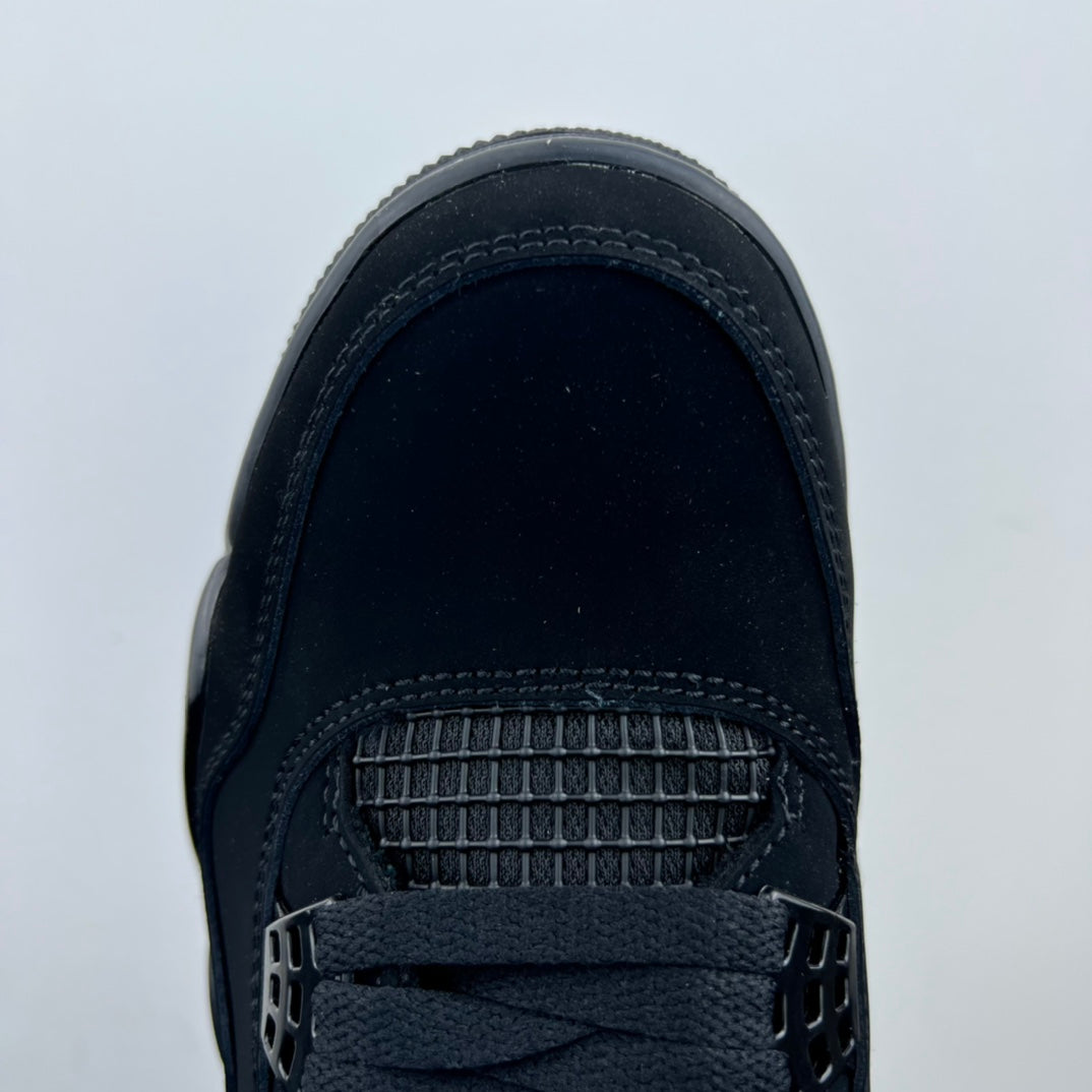 Air Jordan 4 shoe tongue and lacing area with mesh panel and metal lace cage
