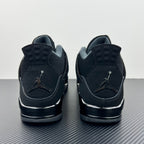Air Jordan 4 sneakers heel view with rear Jumpman logo and cushioned collar