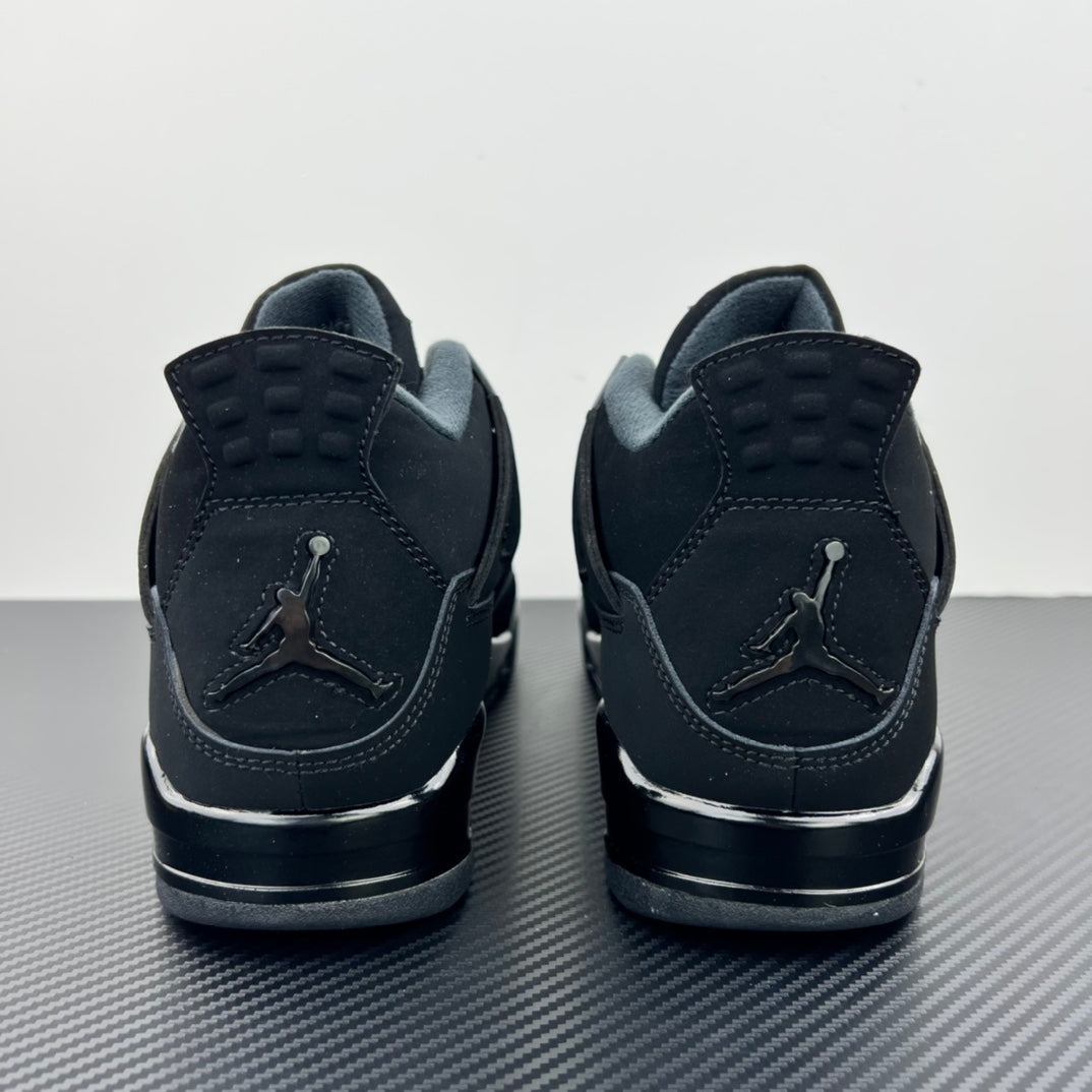 Air Jordan 4 sneakers heel view with rear Jumpman logo and cushioned collar