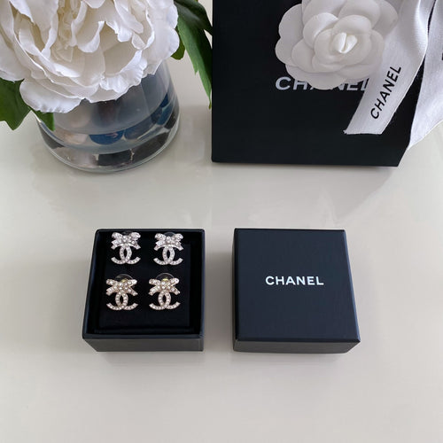 Rhinestone CC earrings in black gift box, plus matching dark blue presentation box