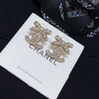 Rhinestone CC logo stud earrings with silver-toned metal and clear crystal detailing