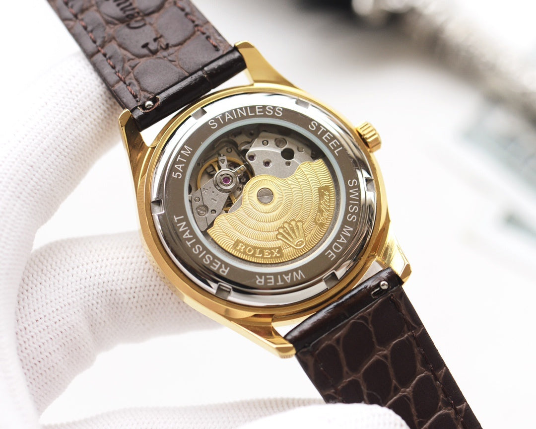 Rolex watch caseback with visible mechanical movement and gold-toned ring