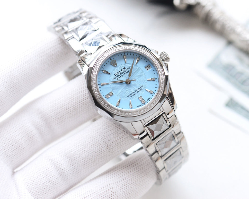 Rolex wristwatch with light blue dial and stainless steel bracelet, gold hands and markers.