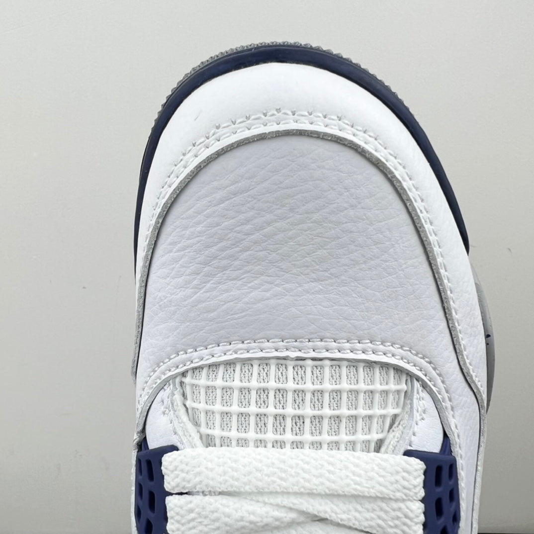 Air Jordan 4 sneaker upper close-up with white textured collar and stitching