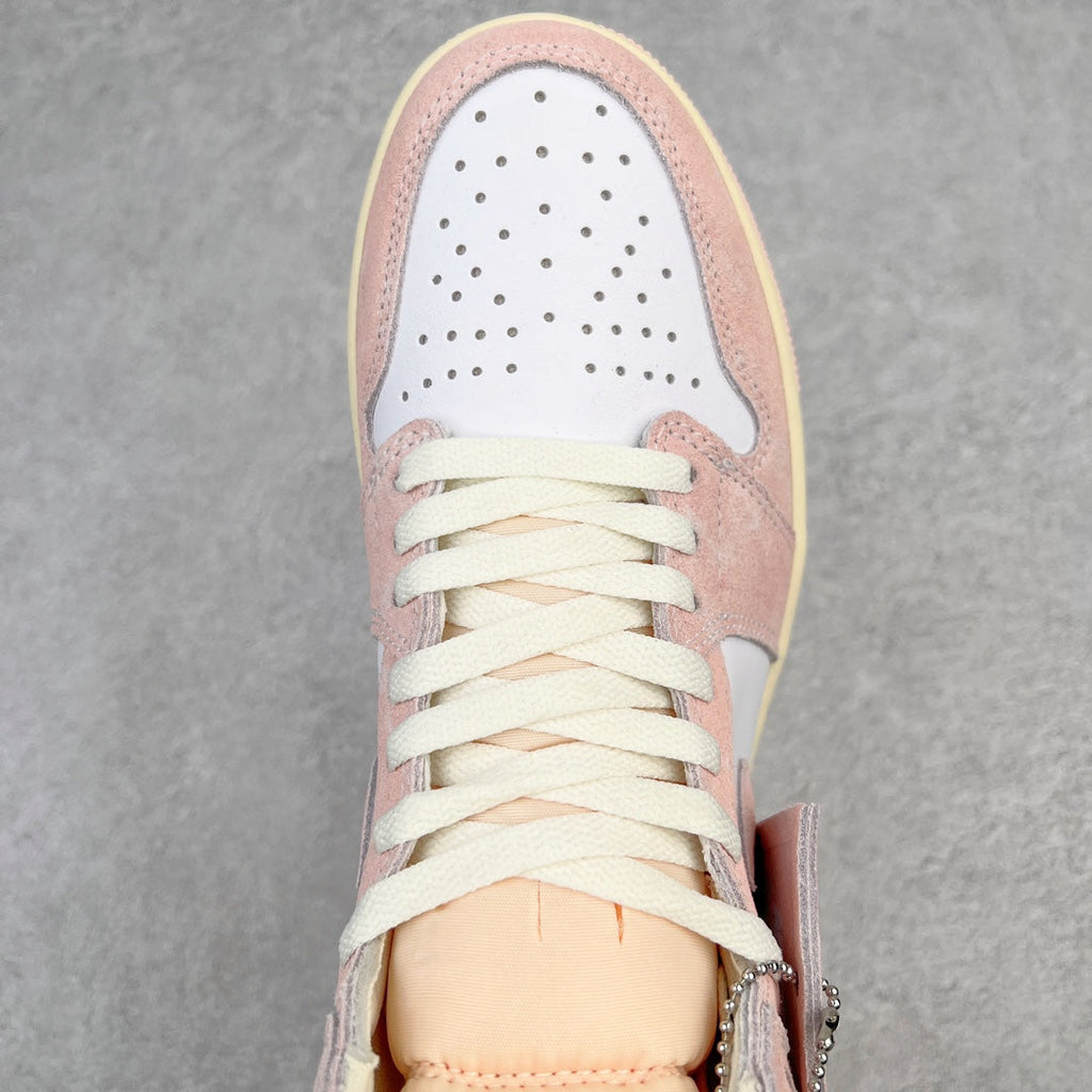 Air Jordan 1 Retro High OG toe cap and laces in pink suede with perforations and cream lining
