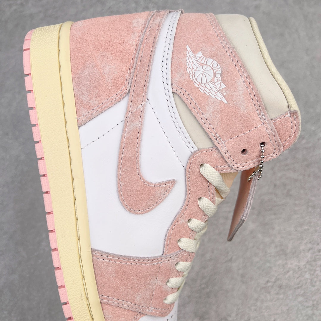 Air Jordan 1 Retro High OG side close-up with white swoosh, pink suede, and Air logo