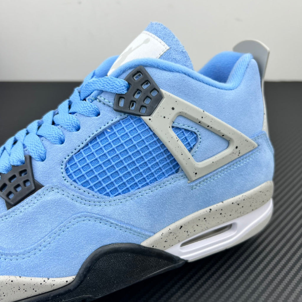 Light blue Air Jordan 4 sneakers with silver lace eyelet panel and black midsole