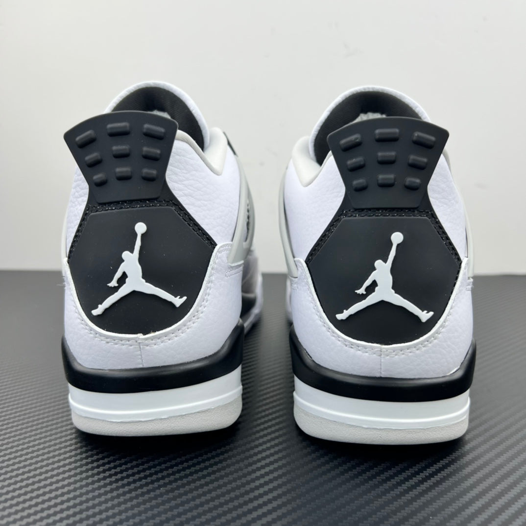 Air Jordan 4 sneakers with white uppers, black heel panels, and Jumpman logo