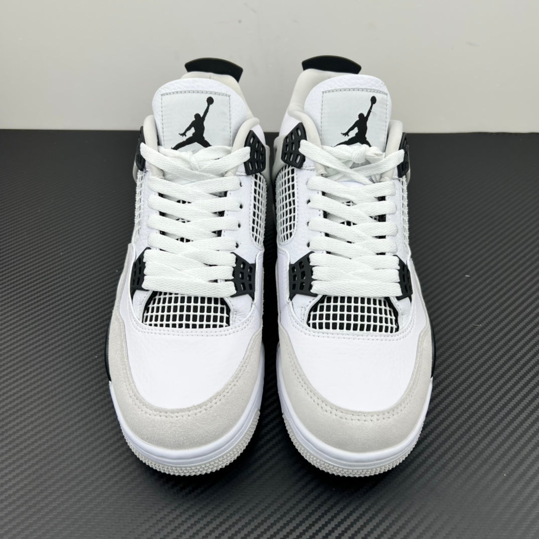 Pair of white Air Jordan 4 sneakers with lace-up fronts and black Jumpman logos