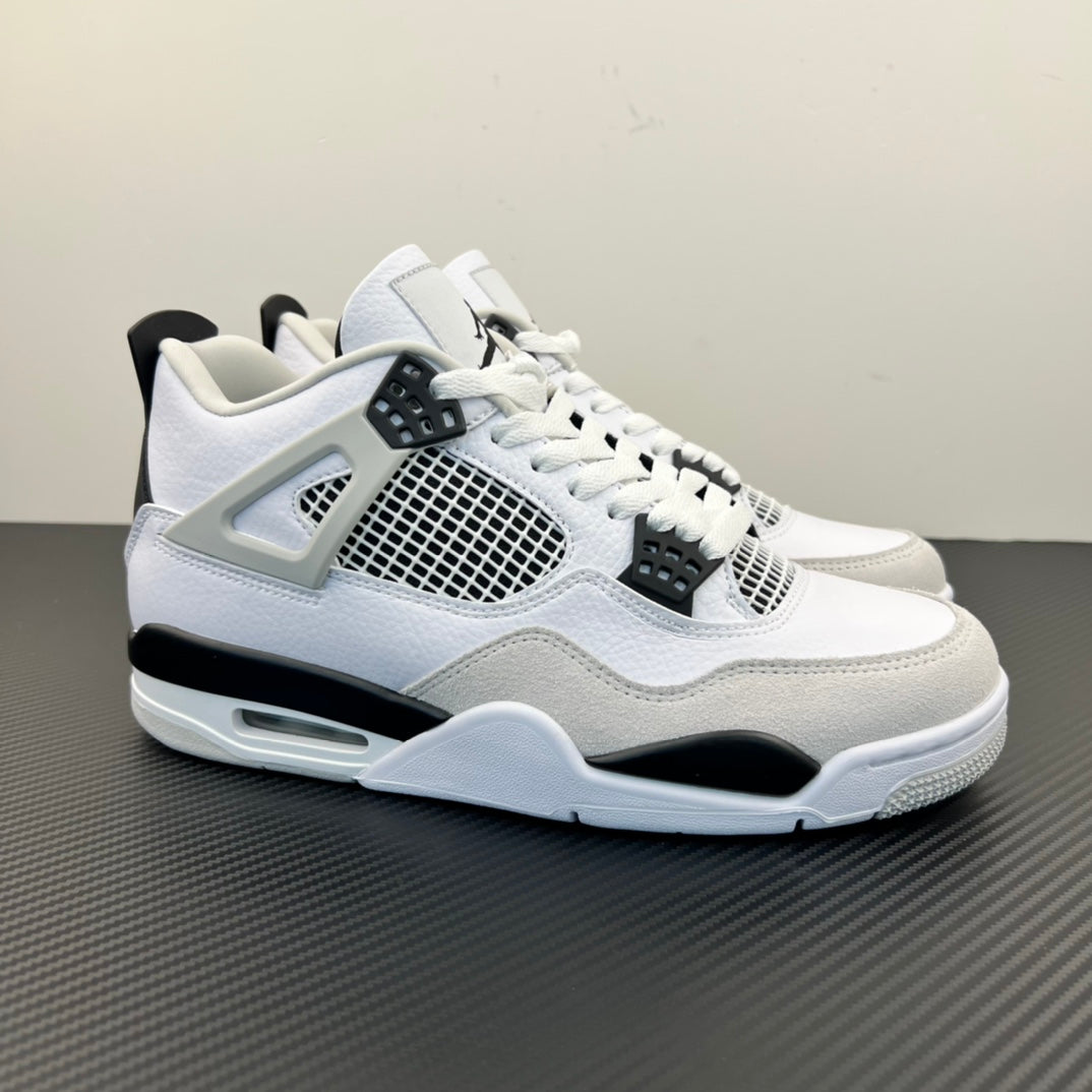 Air Jordan 4 sneaker with white leather, black details, mesh panel, and Air sole