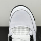 White sneaker toe and lace area with textured mesh panel and black collar trim