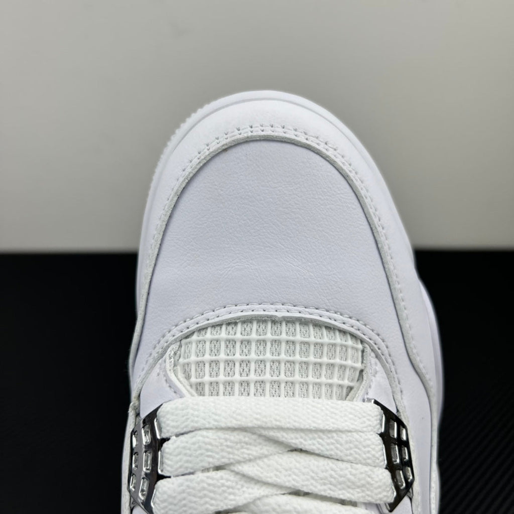 White Air Jordan 4 toe area with lace strap and mesh insert detail