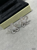 Silver crystal flower stud earrings on gold box