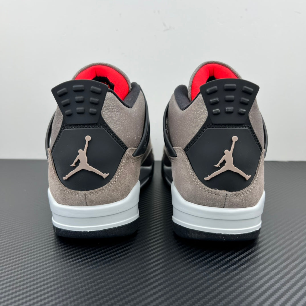 Back view of taupe Air Jordan 4 sneakers with black heel panels and white midsole