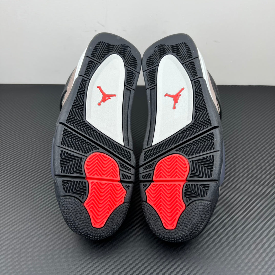 Air Jordan 4 outsole with black rubber tread and red traction pods