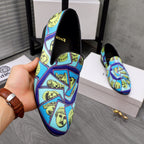 Versace printed slip-on shoes in blue with yellow face collage and black lining
