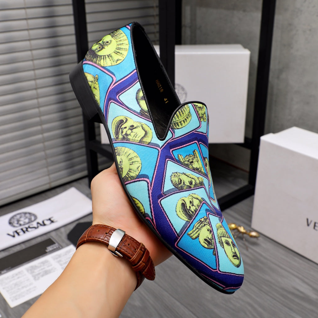 Versace printed loafers, blue and yellow face graphics with black interior lining