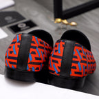 Versace luxury slip-on shoes, orange-blue geometric print with black heel