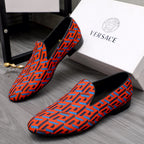 Versace luxury loafers, orange-blue geometric pattern, black sole