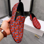 Versace luxury slip-on shoes, orange-blue geometric print, black lining