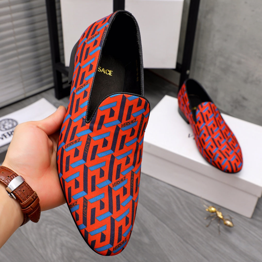 Versace luxury slip-on shoes, orange-blue geometric print, black lining