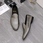 Gold and white rhinestone slip-on loafers with black uppers and pointed toe