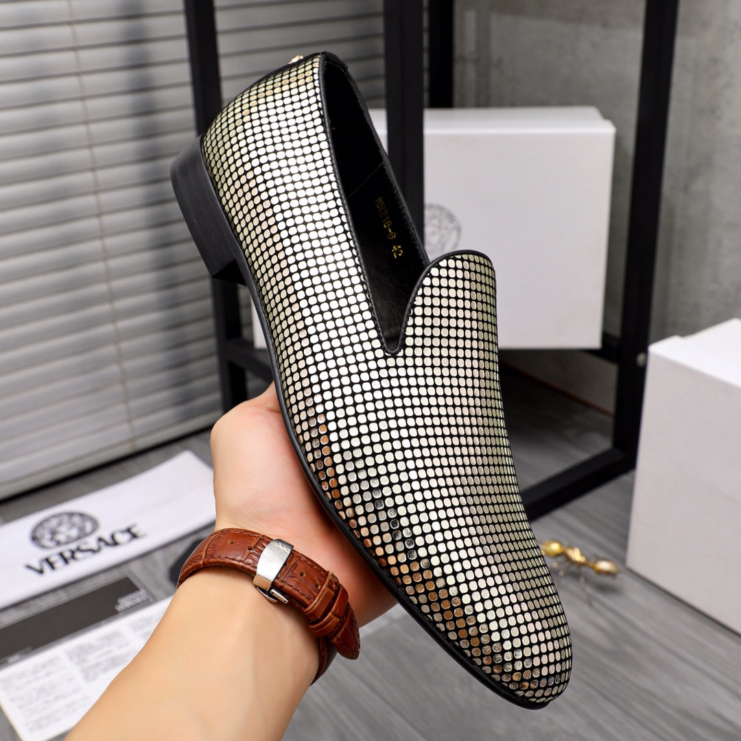 Gold and white rhinestone slip-on loafer with black collar and flat base