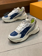 White and blue monogram unisex sneakers, front view