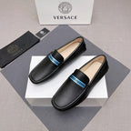 Black leather loafers with blue logo band, slip-on with beige lining