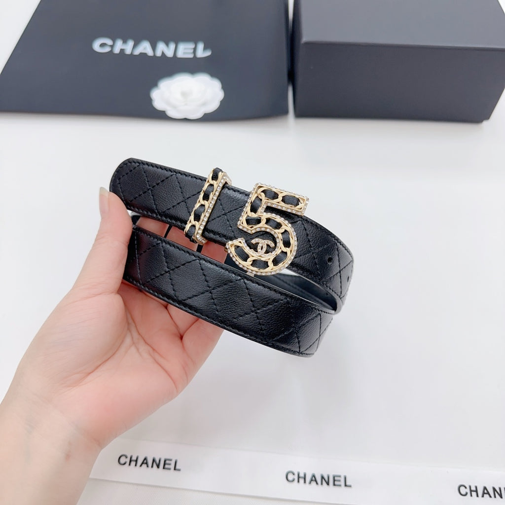 Chanel black leather belt with quilted pattern and ornate gold-tone CC buckle