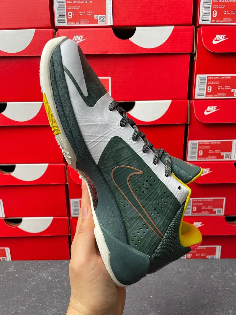 Nike Zoom Kobe 5 Protro EYBL basketball shoes, angled side view with green upper and yellow collar