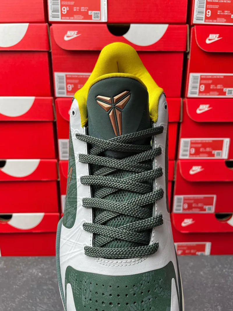 Nike Zoom Kobe 5 Protro EYBL basketball shoes, front view with basketball-themed emblem and green laces