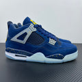 Air Jordan 4 sneaker in blue with gray mesh panels and white Air sole detail