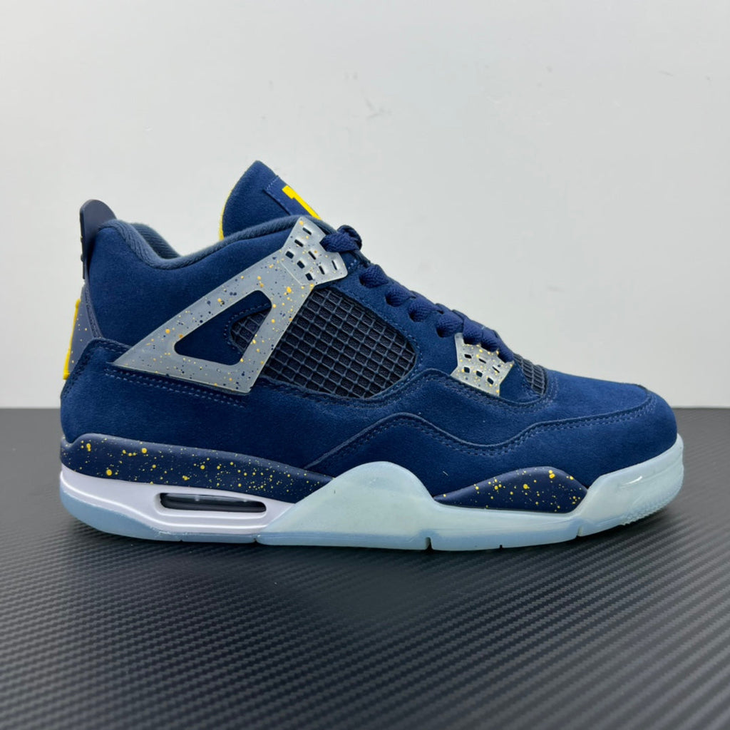 Air Jordan 4 sneaker side view in blue with speckled trim and white sole