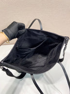 Prada nylon tote bag with open top showing dark interior lining