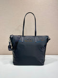 Prada nylon tote bag in dark navy, with top handles and side zip pockets