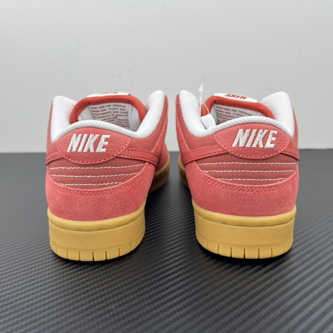Low-top sneakers rear view in pink suede with white heel lining and yellow sole