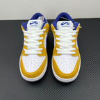Nike Dunk SB Low Pro sneakers, back view with white laces in gold, white and navy