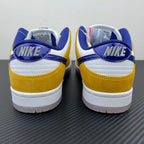Nike Dunk SB Low Pro sneakers, heel view in white, gold and navy with Nike SB branding