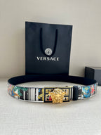 Versace belt on display with multicolor patterned strap and gold lion buckle